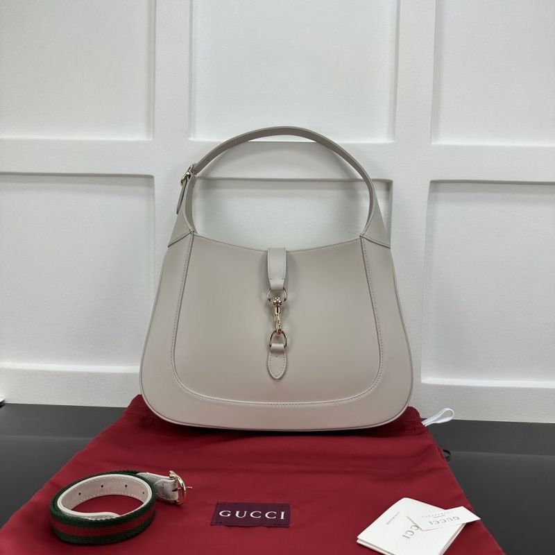 G*u*i top handle bags